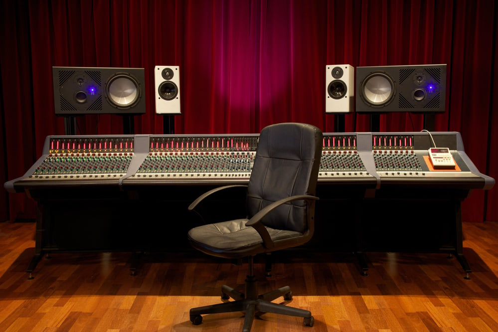 A musical recording studio and chair